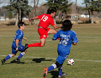 Huskies play Football not Soccer for ACAC Crown