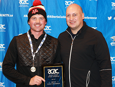 Michael Harrison, left, receives his men's individual award from Joel Mrak on behalf of the ACAC on Sunday (Jefferson Hagen photo).