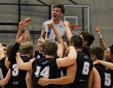 Keyano Huskies libero Alex Sabourin is lifted on his team&rsquo;s shoulders after the bronze medal winning points at the 2017-2018 Canadian Collegiate Athletic Association (CCAA) Men's Volleyball Championships  (Credit Erwin Kuhr)