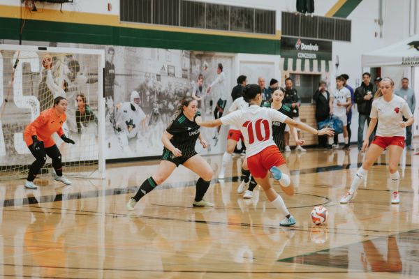 Trojans cruise to gold medal birth over Rustlers