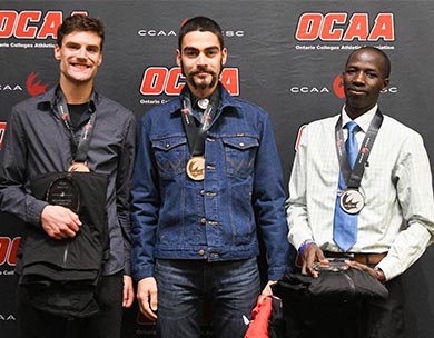 Podium sweep (from left) Red Deer Kings Mathew Hope, bronze, 28:01; SAIT Trojans Matthew Travaglini, gold, 26:19 and Concordia University of Edmonton Thunder rookie Leonard Chesoo, silver, 27:22